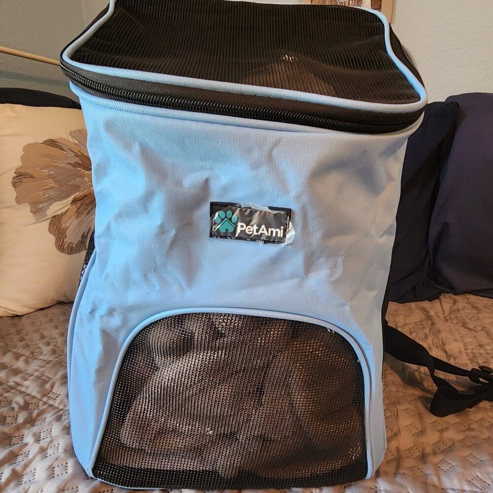 Petami 11" wide and 16" tall Pet carrier/backpack. Light blue/black. Used once